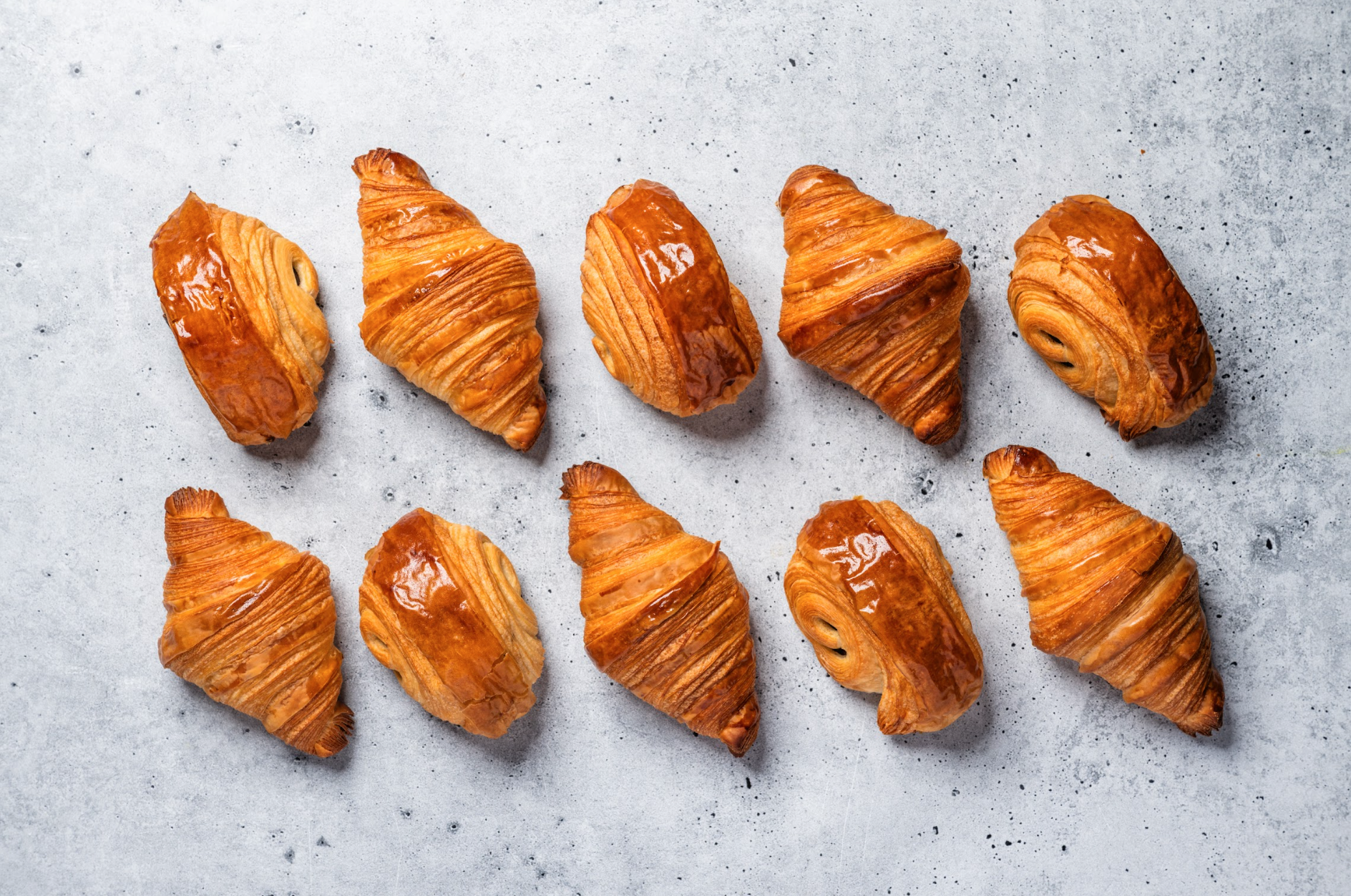 Two rows of 5 perfectly baked croissants