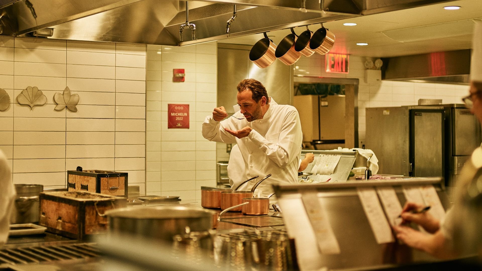 Chef Daniel Humm tasting something in the kitchen 