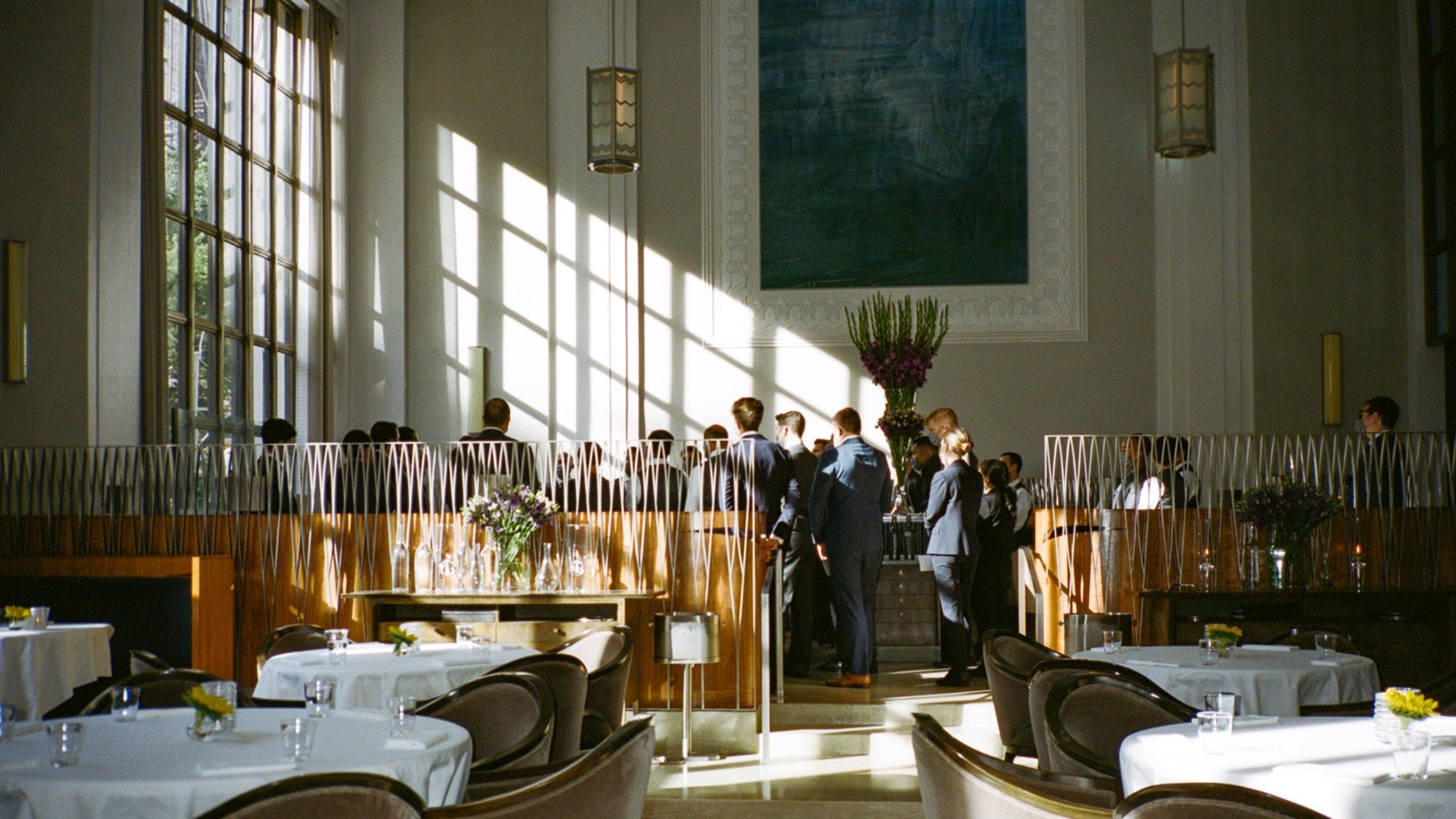 The dining room team meeting before opening for service. 