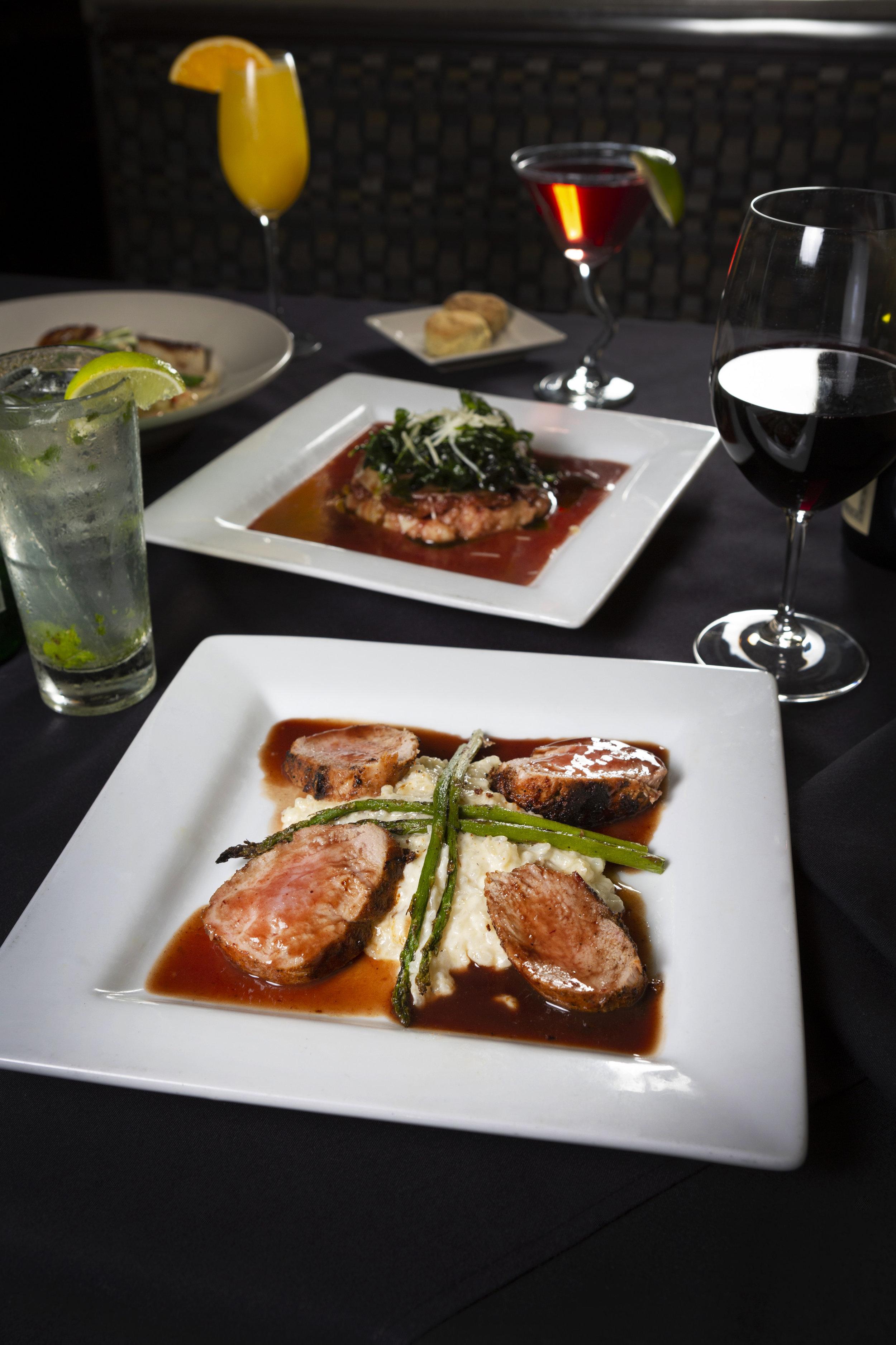 3 plated dinner items on table